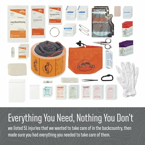 Comprehensive backcountry first aid kit with various medical supplies.