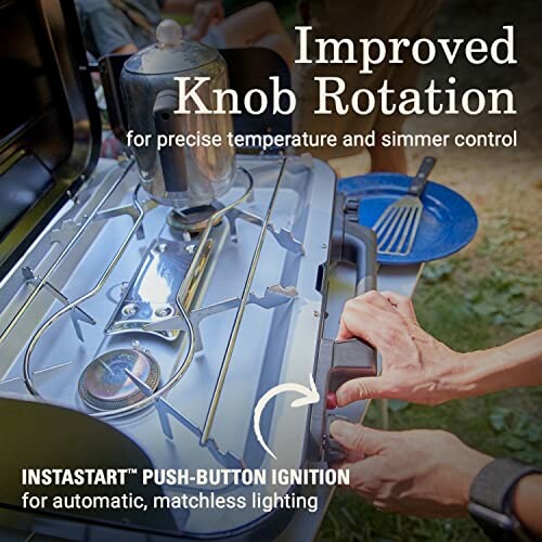 Camping stove with improved knob rotation feature for precise temperature control.