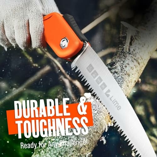 Hand saw cutting through a tree branch, showcasing durability.