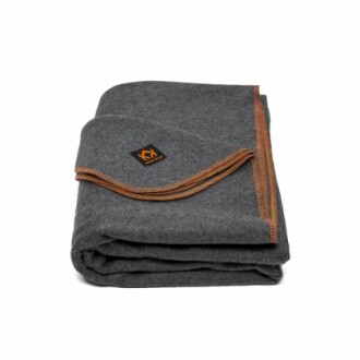 Folded grey blanket with logo and orange trim