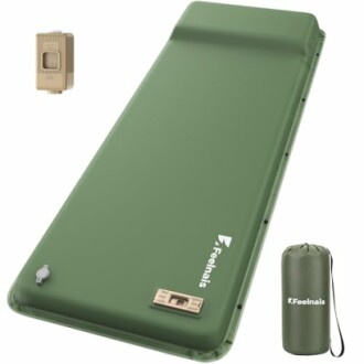 Green inflatable camping mattress with pump and carry bag.
