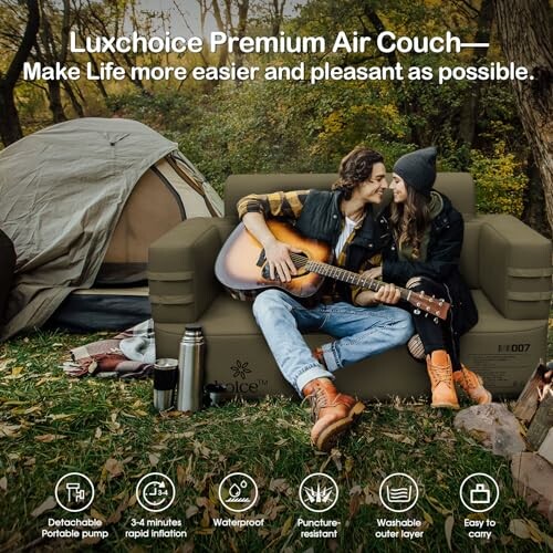 Couple sitting on Luxchoice air couch near a tent, holding a guitar.