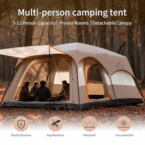 Large multi-person camping tent with people inside in a forest setting.