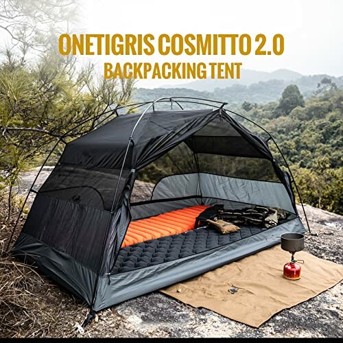 OneTigris Cosmitto 2.0 backpacking tent set up on a rocky surface with trees in the background