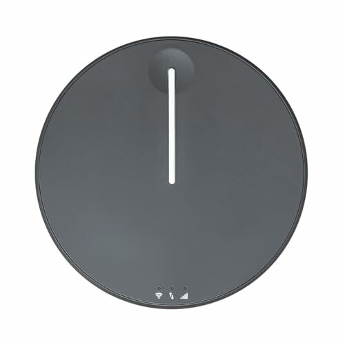 Top view of a black round smart scale with a white line display.