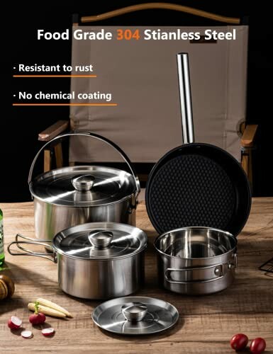 Stainless steel cookware set on wooden table.