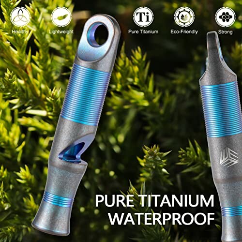 Pure titanium waterproof whistle in greenery background.